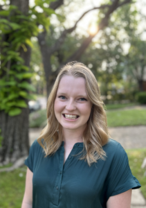 Genetic counseling student Alison Merket stands outside